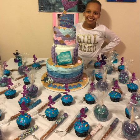 Arianna with a cake