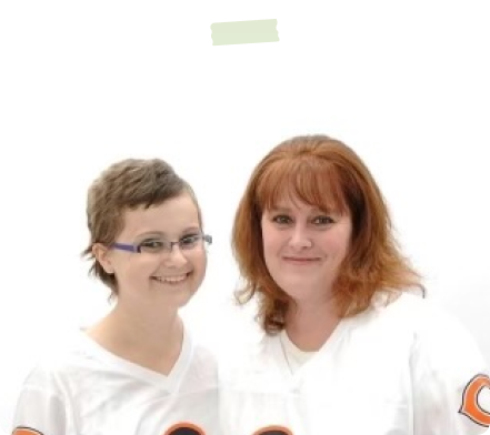 two ladies in white shirts smiling