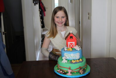 girl with a farm cake