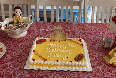 Beauty and the Beast cake and memorabilia