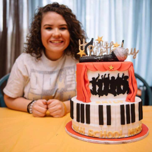 girl with music cake