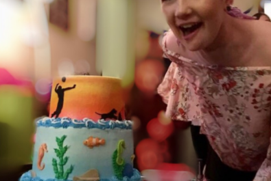 woman with a custom cake