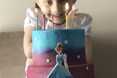 girl with a cinderella cake
