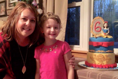 girl and mother with a snow white cake