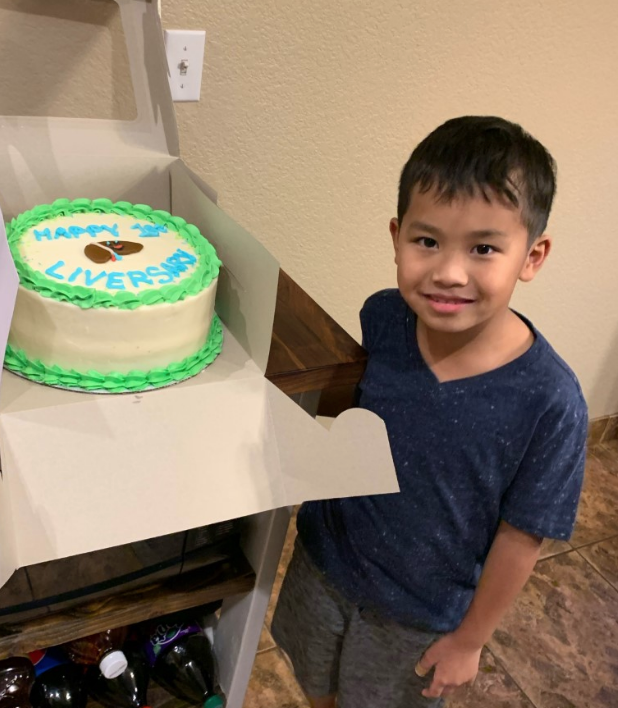 boy with a custom cake