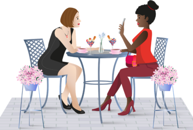 two women sitting at a table with tea